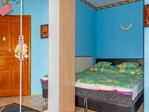 En eller flere senger på et rom på Holiday Home Colore by Interhome