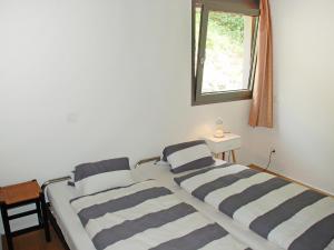 Cama o camas de una habitación en Apartment Allaventura by Interhome