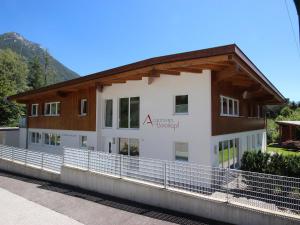 a house on the side of a bridge at Apartment Am Bärenkopf by Interhome in Maurach