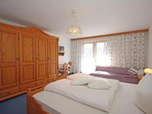 Voodi või voodid majutusasutuse Apartment Kircher-1 by Interhome toas