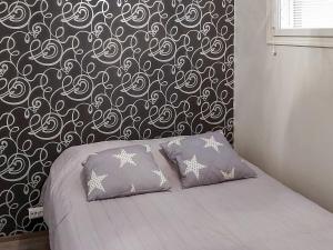 Postel nebo postele na pokoji v ubytování Holiday Home Tyrsky by Interhome