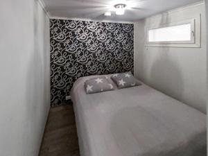 Postel nebo postele na pokoji v ubytování Holiday Home Tyrsky by Interhome + 4 fotografie