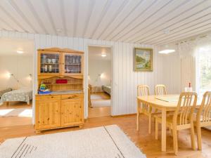 Postel nebo postele na pokoji v ubytování Holiday Home Hiekkalampi by Interhome