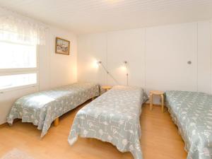 Postel nebo postele na pokoji v ubytování Holiday Home Hiekkalampi by Interhome
