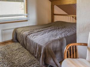 En eller flere senge i et værelse på Holiday Home Alppitähti by Interhome