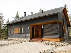 a small house with a gambrel roof at Holiday Home Villa biegga by Interhome in Kyrö