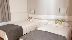 Posteľ alebo postele v izbe v ubytovaní Apartamentos Horizonte + 37 fotografií