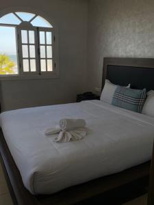 AMWAJ HOTEL客房内的一张或多张床位