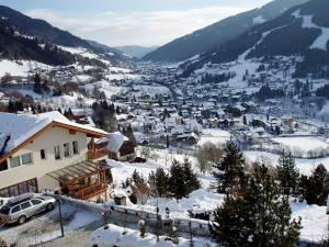 a town covered in snow in a mountain at Studio Edelweiss by Interhome in Obertschern
