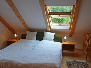 Postel nebo postele na pokoji v ubytování Holiday Home Parkany 1 by Interhome