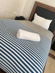 AMWAJ HOTEL客房内的一张或多张床位