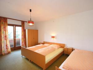 Postel nebo postele na pokoji v ubytování Apartment Dornauer-1 by Interhome