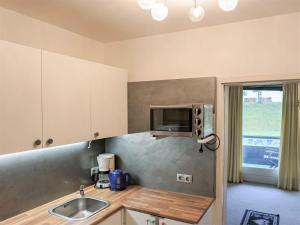 TV a/nebo společenská místnost v ubytování Apartment Alpenland-18 by Interhome