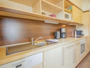 Η κουζίνα ή μικρή κουζίνα στο Apartment Alpin-5 by Interhome