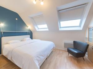 Postel nebo postele na pokoji v ubytování Apartment Tussen water en wind by Interhome