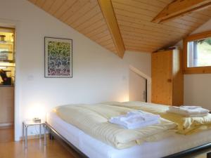 Postel nebo postele na pokoji v ubytování Apartment Melodie Apt-W by Interhome