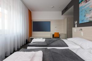 Katil atau katil-katil dalam bilik di MSC Hotel