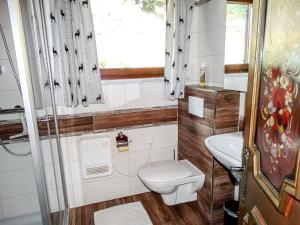 Łazienka w obiekcie Holiday Home Lotte by Interhome