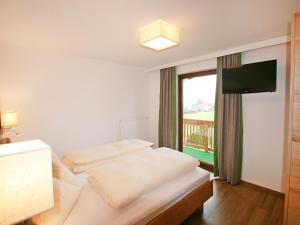 Postel nebo postele na pokoji v ubytování Holiday Home Happy by Interhome + 23 fotografií