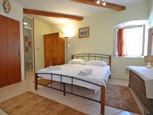Postel nebo postele na pokoji v ubytování Holiday Home Kala by Interhome