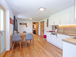 A kitchen or kitchenette at Apartment Renauer by Interhome