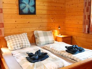 Postel nebo postele na pokoji v ubytování Chalet Chalet Jupiter by Interhome