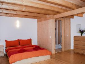 A bed or beds in a room at Holiday Home La Cassìna by Interhome