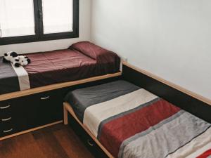 Voodi või voodid majutusasutuse Apartment Ferreries by Interhome toas