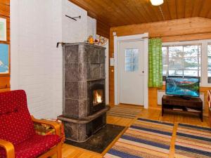 Et opholdsområde på Holiday Home Maunonlahti by Interhome + 16 billeder