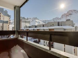 a view of a snowy city from a balcony at Apartment Platières-23 by Interhome in Tignes