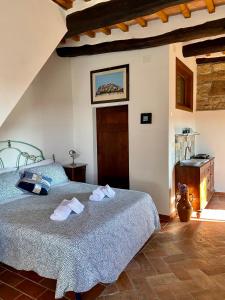 Posteľ alebo postele v izbe v ubytovaní La Sorpresa Monolocale con VISTA VALLATA