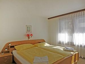 Letto o letti in una camera di Apartment Rustica Apt- M by Interhome