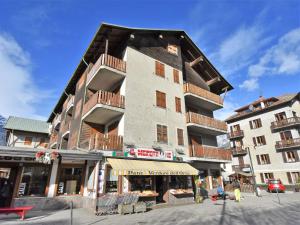 a large building on a street in a city at Studio San Anton by Interhome in Bormio