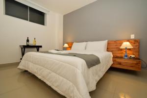 Postel nebo postele na pokoji v ubytování Tik by Bernalo Hotels + 37 fotografií