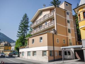 a large building on the side of a street at Apartment Schbert-Franz Top 12 by Interhome in Bad Hofgastein