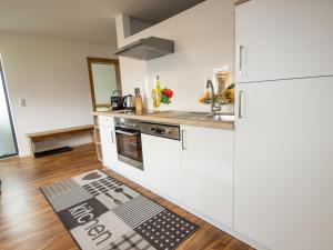 Kuchyňa alebo kuchynka v ubytovaní Apartment Mundlers Hoamatl Top 3 by Interhome