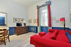 Televízia a/alebo spoločenská miestnosť v ubytovaní Studio Apt In Rome City Centre Via Gregoriana by Halldis