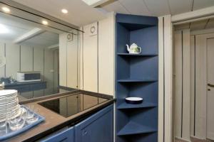 Kuchyňa alebo kuchynka v ubytovaní Studio Apt In Rome City Centre Via Gregoriana by Halldis