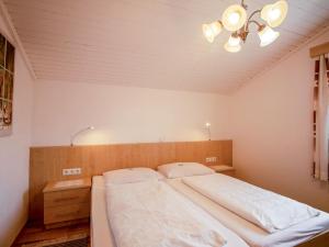 Postel nebo postele na pokoji v ubytování Apartment Hecht by Interhome