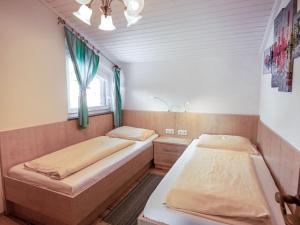 Postel nebo postele na pokoji v ubytování Apartment Hecht by Interhome