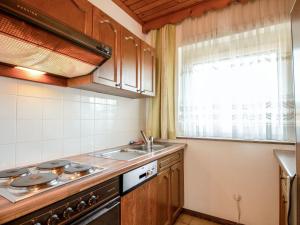 Kuchyň nebo kuchyňský kout v ubytování Apartment Hecht by Interhome