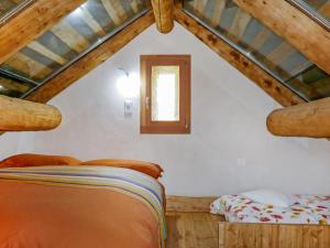 A bed or beds in a room at Holiday Home Rustico Andrea by Interhome