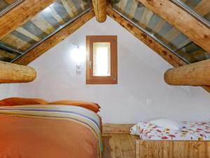 Postel nebo postele na pokoji v ubytování Holiday Home Rustico Andrea by Interhome