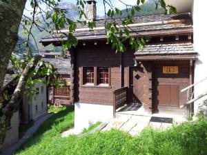 an old house with a sign on the side of it at Chalet Chalet A Coeur by Interhome in Grimentz