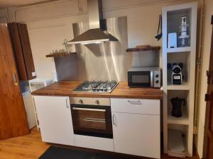 
A kitchen or kitchenette at Latour de Carol

