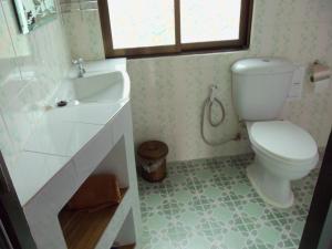 Ванная комната в Baitong Homestay