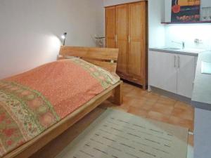 Giường trong phòng chung tại Apartment Donau by Interhome