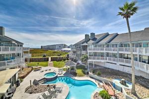 A view of the pool at Coastal Condo with Outdoor Pool - Pets Welcome! or nearby