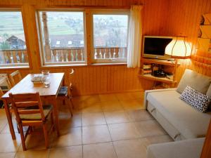 Posezení v ubytování Apartment Sur Baselgia by Interhome + 39 fotografií