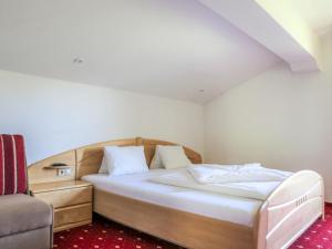 Ένα ή περισσότερα κρεβάτια σε δωμάτιο στο Holiday Home Rossbrand by Interhome